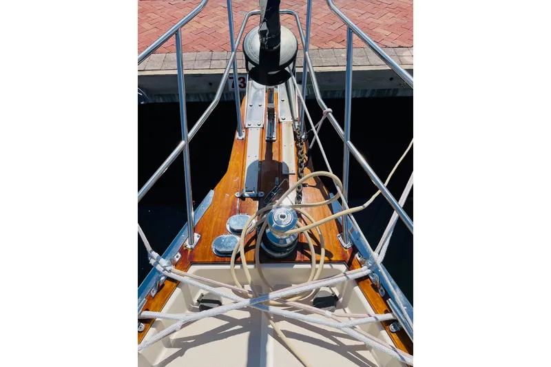 Slide: The Image of Bow of 2002 Island Packet 420 sailboat with ropes and winch at dock. - 16