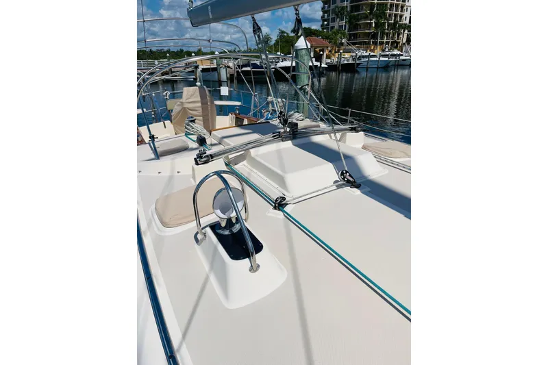 Slide: The Image of Deck view of 2002 Island Packet 420 sailboat docked at marina. - 20