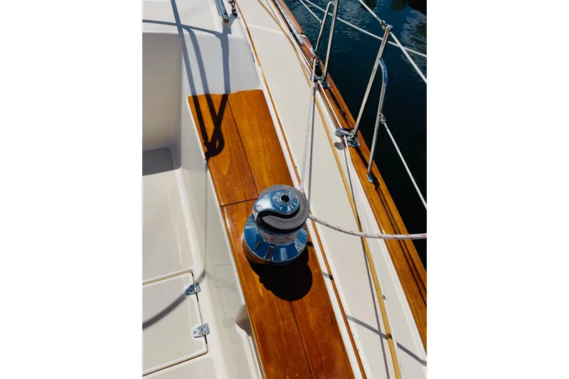 Slide: The Image of Deck of 2002 Island Packet 420 sailboat with winch and wooden trim. - 24