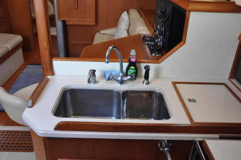 Slide: The Image of Galley sink area in 2002 Island Packet 420 yacht interior. - 53