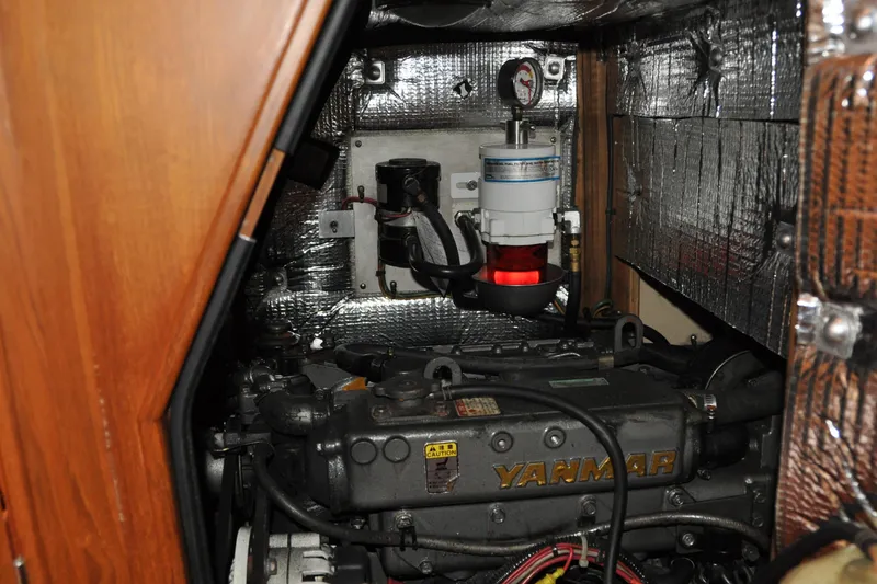 Slide: The Image of Engine compartment of 2002 Island Packet 420 sailboat with Yanmar engine. - 85