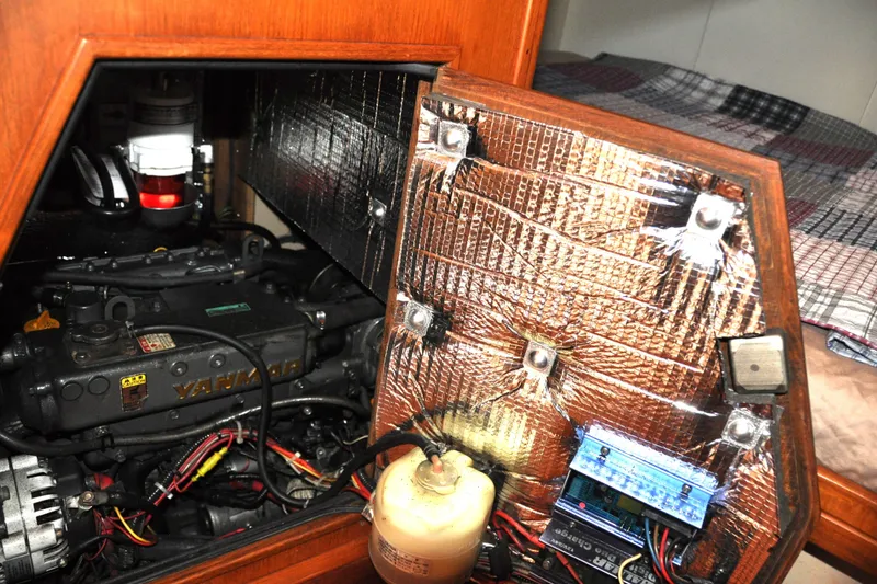 Slide: The Image of Engine compartment of a 2002 Island Packet 420 sailboat with Yanmar engine. - 86