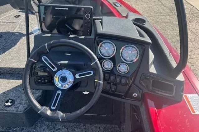 Slide: The Image of 2025 Tracker Targa V-19 WT Tournament Edition dashboard with steering wheel and gauges. - 15