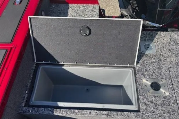 Slide: The Image of Open storage compartment on 2025 Tracker Targa V-19 WT Tournament Edition boat. - 21