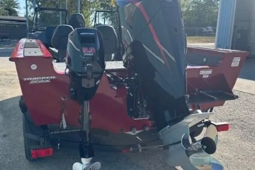 Slide: The Image of 2025 Tracker Targa V-19 WT Tournament Edition boat with powerful outboard motor. - 4