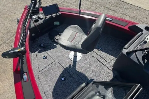 Slide: The Image of 2025 Tracker Targa V-19 WT Tournament Edition boat interior with seating and control panel. - 6