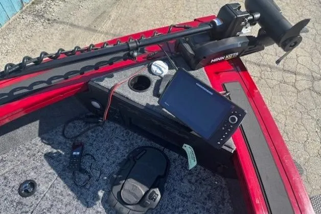 Slide: The Image of 2025 Tracker Targa V-19 WT Tournament Edition boat dashboard with electronics and controls. - 7