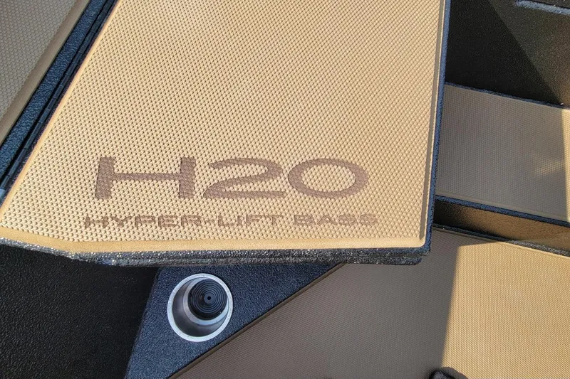 Slide: The Image of 2026 Xpress H20 Bass boat deck with "Hyper Lift Bass" branding. - 6