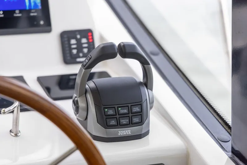 Slide: The Image of Control panel of 2024 MJM 42 boat with Volvo Penta throttle. - 33