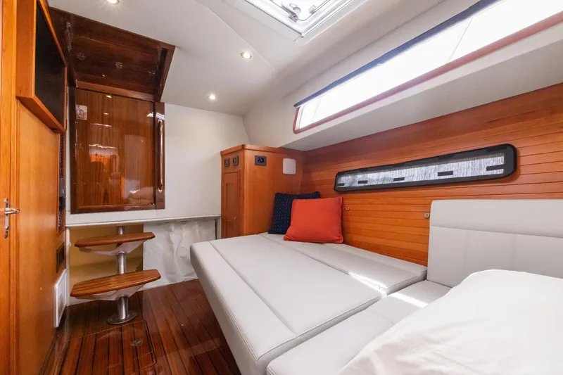 Slide: The Image of Luxurious interior of 2024 MJM 42 yacht with wooden paneling and modern furnishings. - 51