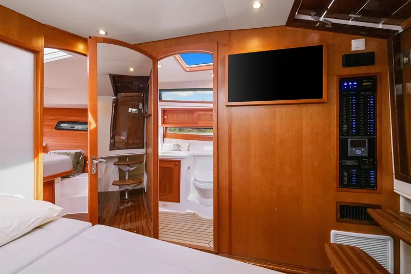 Slide: The Image of Luxurious interior of 2024 MJM 42 yacht featuring wood finishes and modern amenities. - 52