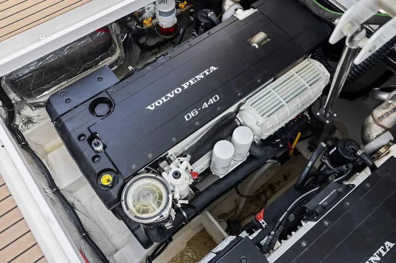 Slide: The Image of 2024 MJM 42 boat engine compartment featuring Volvo Penta D6-440 engine. - 58
