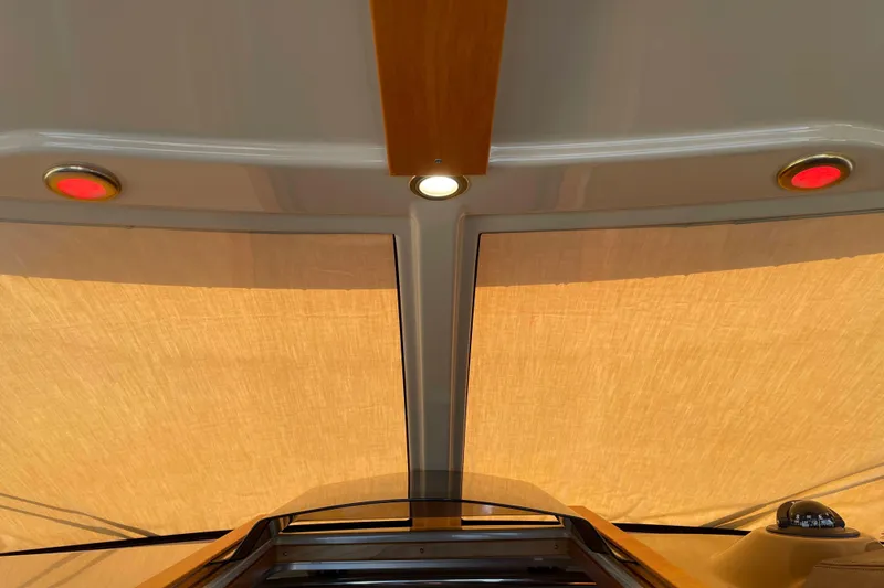 Slide: The Image of Interior view of 2016 Cutwater C-24 Coupe boat with sunroof and lighting. - 22