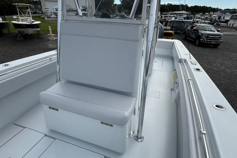 Slide: The Image of 2022 Contender 32 ST boat interior with white seating and sleek design. - 22