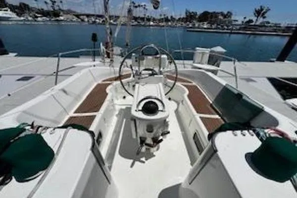Slide: The Image of Cockpit view of 1996 Beneteau Oceanis 400 sailboat docked in marina. - 7