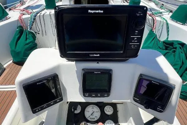 Slide: The Image of Cockpit of 1996 Beneteau Oceanis 400 with Raymarine navigation equipment. - 9