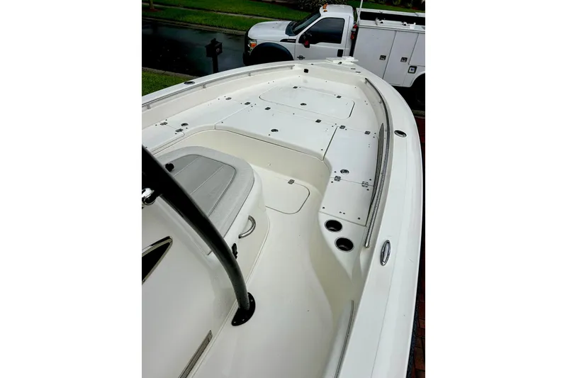 Slide: The Image of 2020 ShearWater 260 Carolina Flare boat deck with seating and storage compartments. - 20