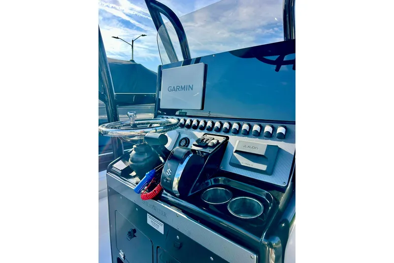 Slide: The Image of 2020 ShearWater 260 Carolina Flare boat console with Garmin display and JL Audio system. - 22