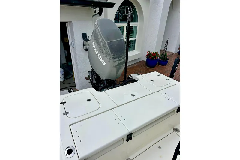 Slide: The Image of Steering console of 2020 ShearWater 260 Carolina Flare boat, featuring modern controls. - 9