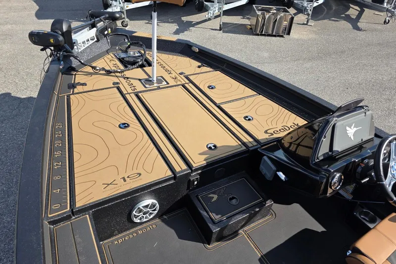 Slide: The Image of Xpress X19 Pro 2026 boat deck with SeaDek flooring and advanced controls. - 3