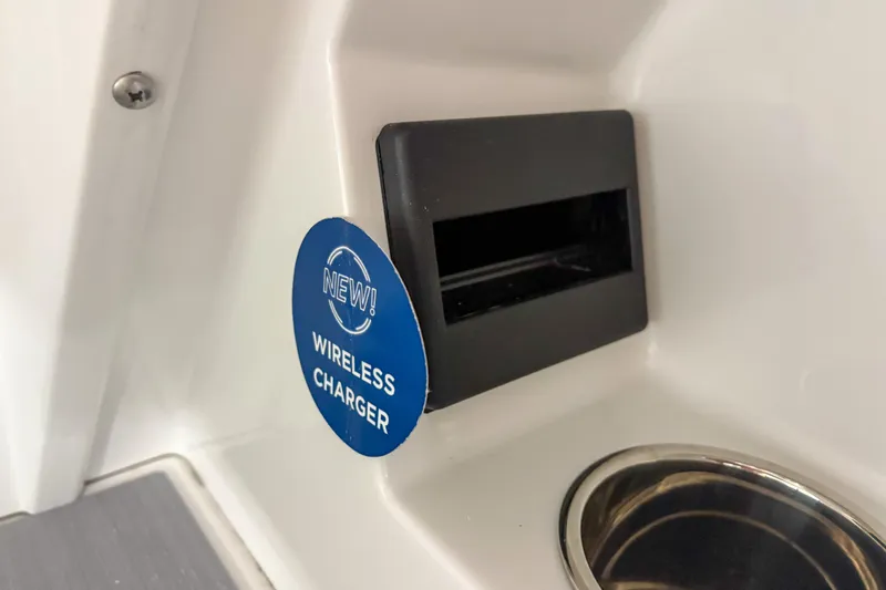 Slide: The Image of New wireless charger in 2026 Trifecta 24UL CS boat interior. - 12
