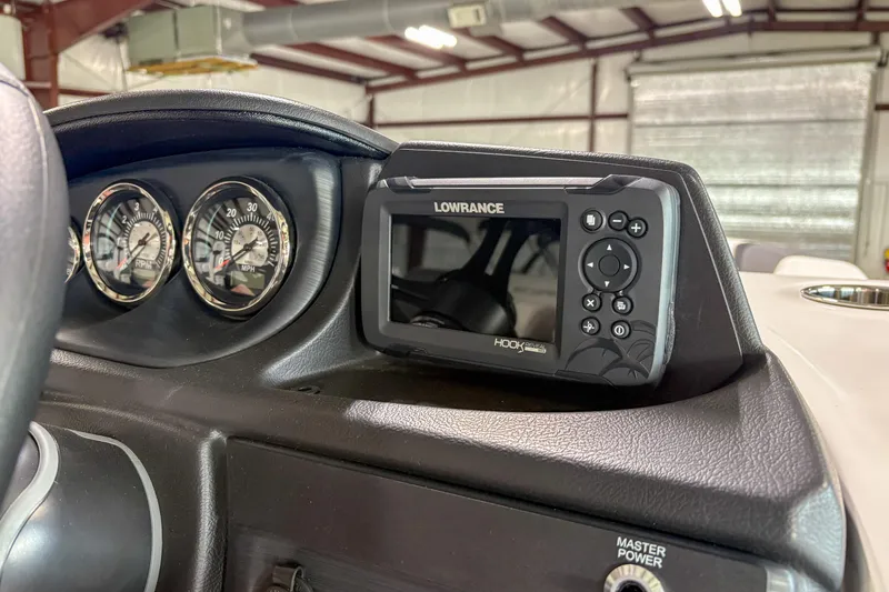 Slide: The Image of Dashboard of 2026 Trifecta 24UL CS with Lowrance Hook Reveal GPS. - 14