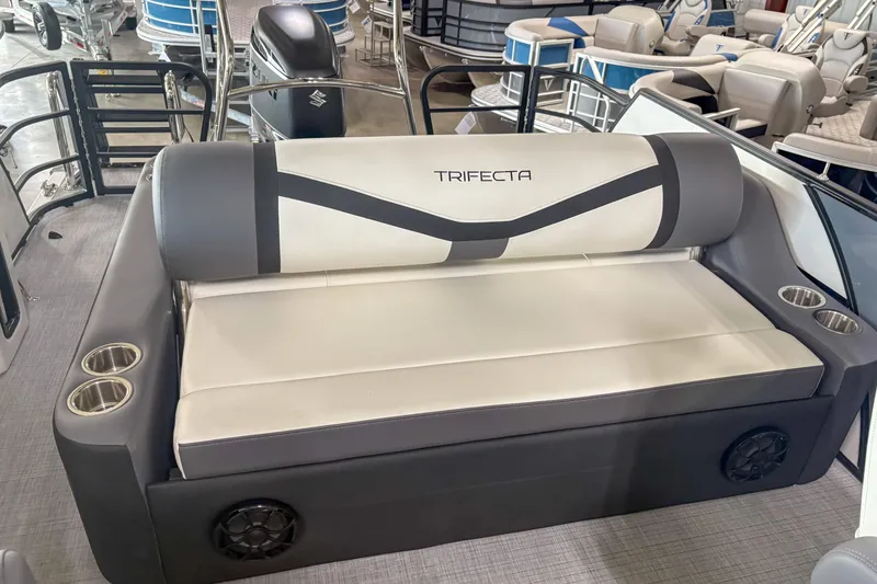 Slide: The Image of Luxurious seating on 2026 Trifecta 24UL CS pontoon boat with cup holders and speakers. - 6