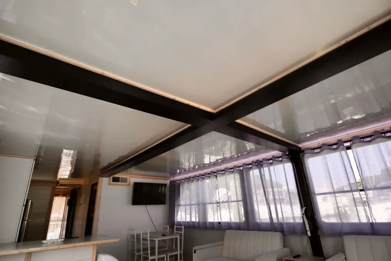 Slide: The Image of Interior of 1997 Fun Country Forerunner with modern decor and large windows. - 31