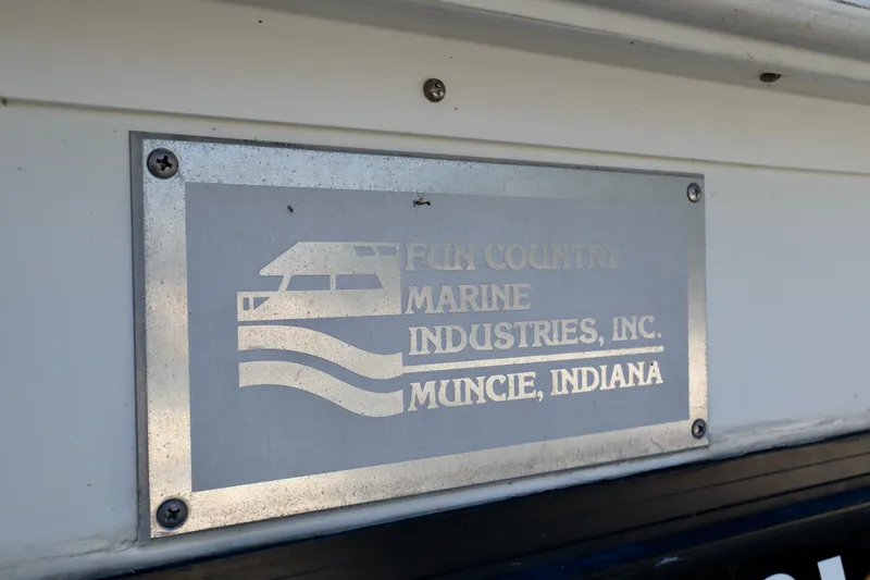 Slide: The Image of Plaque on Fun Country Forerunner 1997, Marine Industries, Muncie, Indiana. - 49