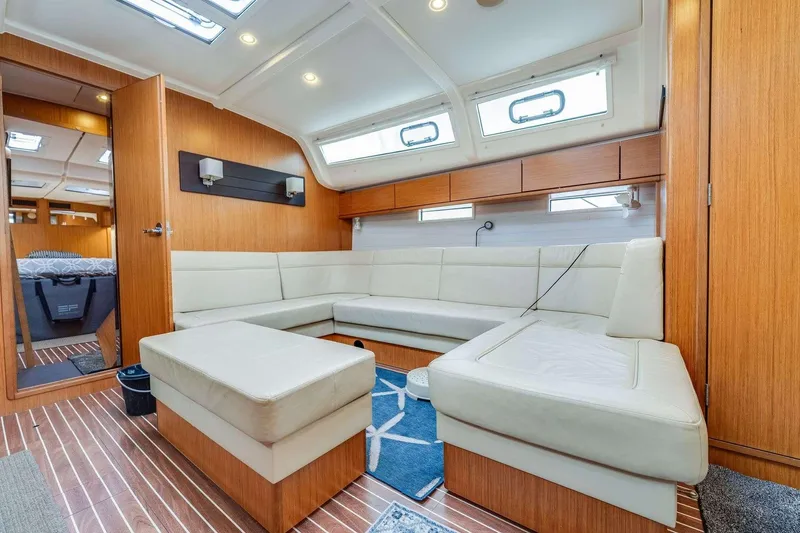 Slide: The Image of Luxurious interior of 2016 Bavaria 51 Cruiser yacht with modern seating and wooden finishes. - 13