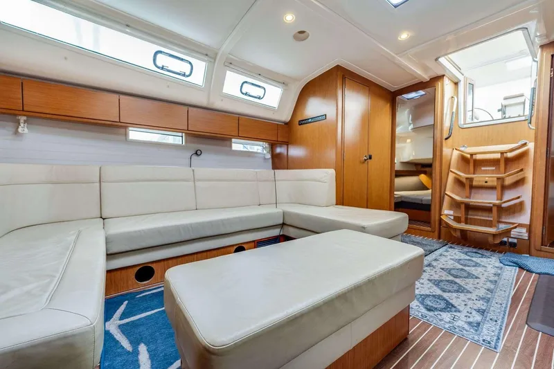 Slide: The Image of Luxurious interior of 2016 Bavaria 51 Cruiser yacht with modern seating and wooden finishes. - 14