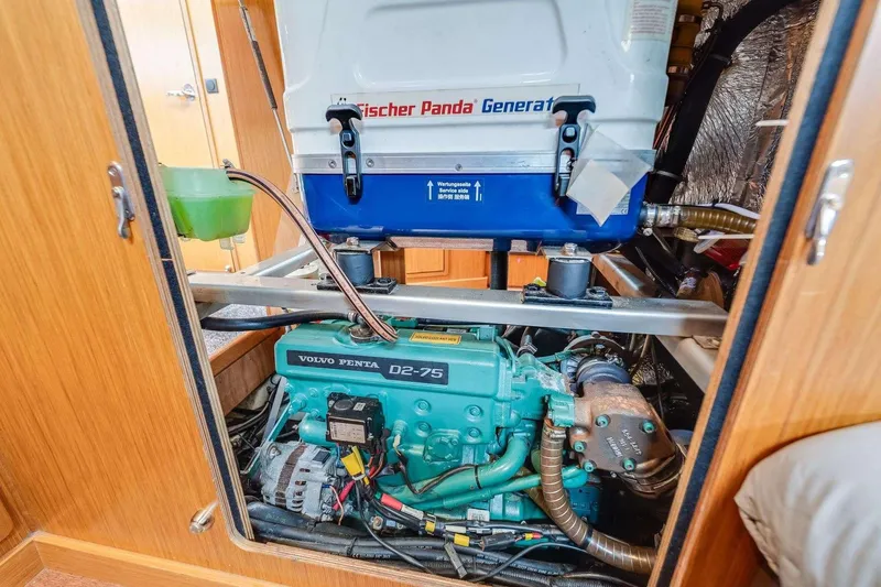 Slide: The Image of Engine room of 2016 Bavaria 51 Cruiser with Volvo Penta D2-75 engine and Fischer Panda generator. - 21