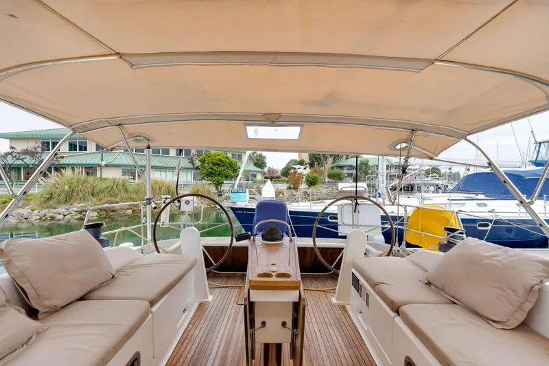 Slide: The Image of Spacious cockpit of 2016 Bavaria 51 Cruiser yacht with dual steering wheels. - 28