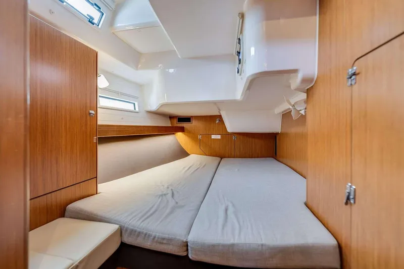 Slide: The Image of Cozy cabin interior of 2016 Bavaria 51 Cruiser yacht with wooden finish. - 6