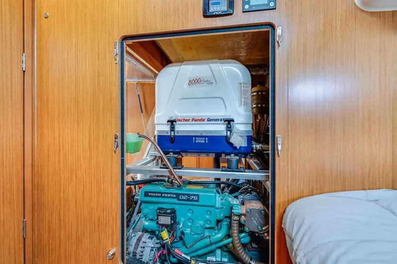 Slide: The Image of Engine room of 2016 Bavaria 51 Cruiser with Volvo Penta D2-75 and Fischer Panda generator. - 20