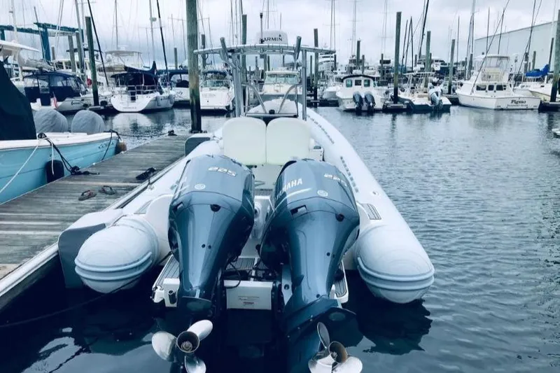 Slide: The Image of 2014 AB Inflatables Oceanus 28 VST with twin Yamaha engines docked at marina. - 10