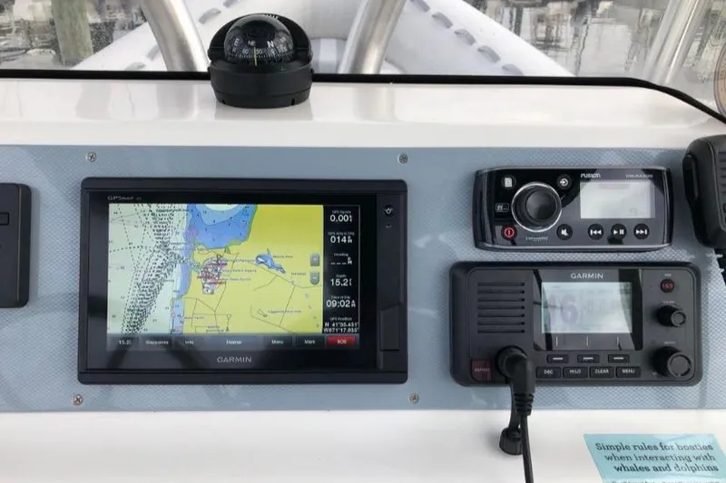 Slide: The Image of Control panel of 2014 AB Inflatables Oceanus 28 VST with navigation and communication devices. - 12