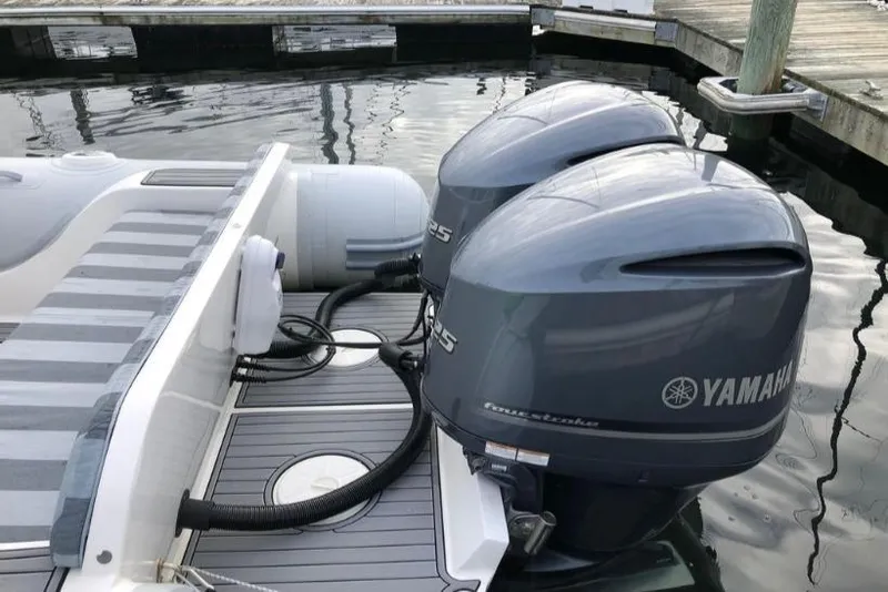 Slide: The Image of 2014 AB Inflatables Oceanus 28 VST with twin Yamaha outboard engines at dock. - 3