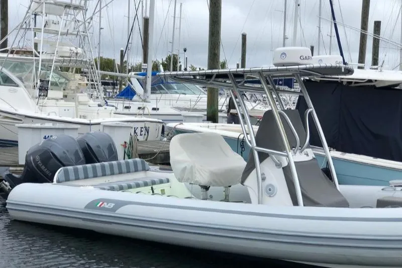 Slide: The Image of 2014 AB Inflatables Oceanus 28 VST boat docked at marina with twin engines. - 4