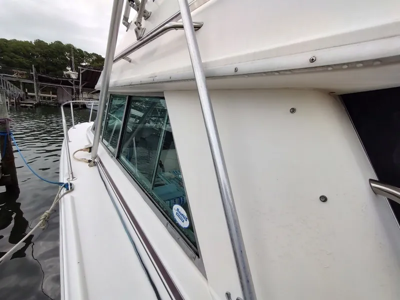 Slide: The Image of Sea Ray 310 Sport Bridge 1992 - 18