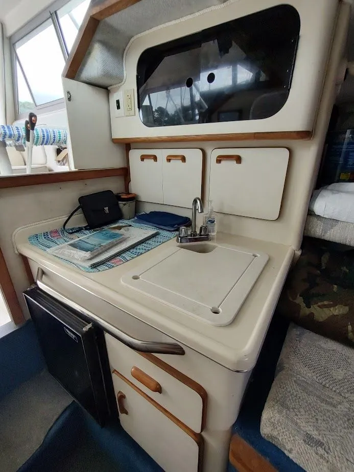 Slide: The Image of Sea Ray 310 Sport Bridge 1992 - 66