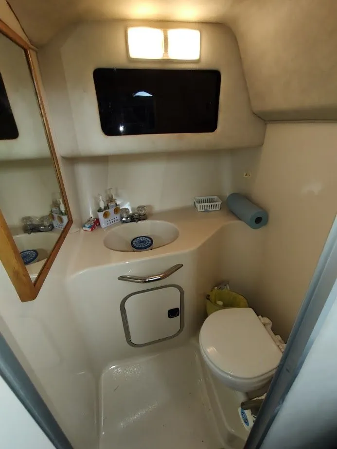 Slide: The Image of Sea Ray 310 Sport Bridge 1992 - 75