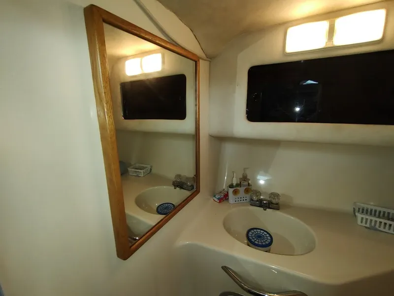 Slide: The Image of Sea Ray 310 Sport Bridge 1992 - 78