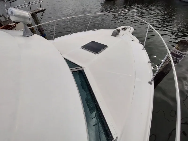 Slide: The Image of Sea Ray 310 Sport Bridge 1992 - 8