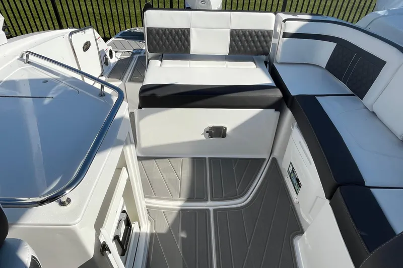 Slide: The Image of 2026 Monterey M-65 boat interior with sleek seating and modern design. - 11