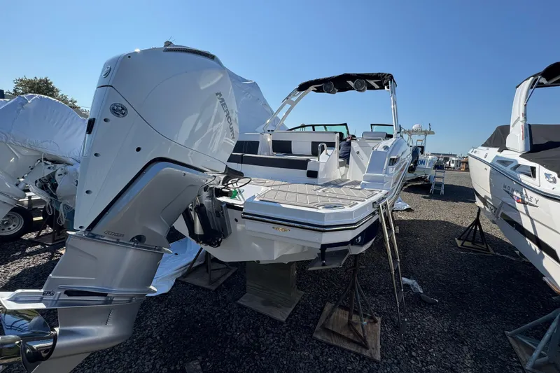 Slide: The Image of 2026 Monterey M-65 boat with Mercury outboard engine on display. - 5