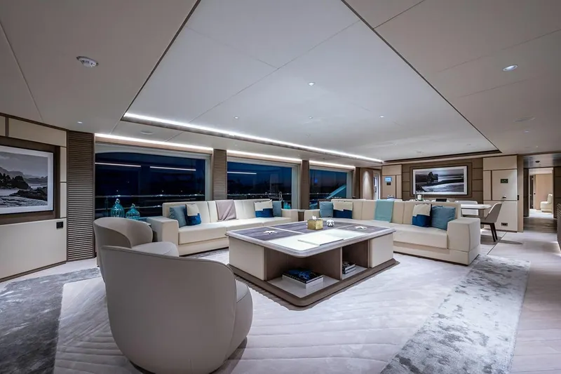 Slide: The Image of Luxurious interior of 2020 Majesty 140 yacht with modern furnishings and panoramic windows. - 28