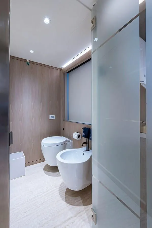 Slide: The Image of Modern bathroom with toilet and bidet on Majesty 140 yacht, 2020 model. - 42