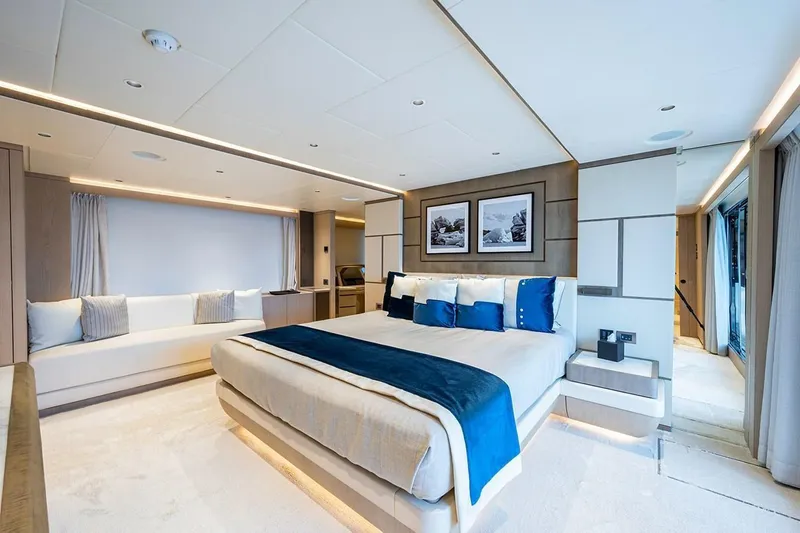 Slide: The Image of Luxurious bedroom interior on 2020 Majesty 140 yacht, featuring elegant decor and modern amenities. - 43