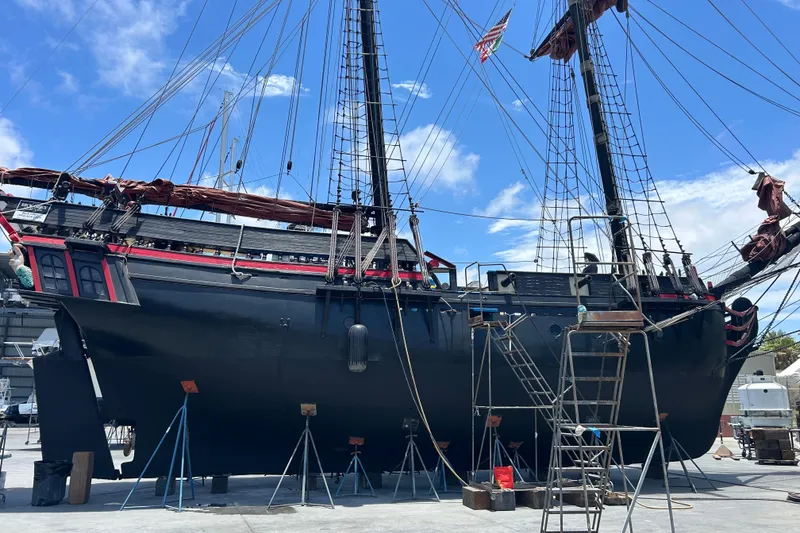 Slide: The Image of Vintage 1977 Custom 80 Brigantine ship under maintenance in a shipyard. - 65